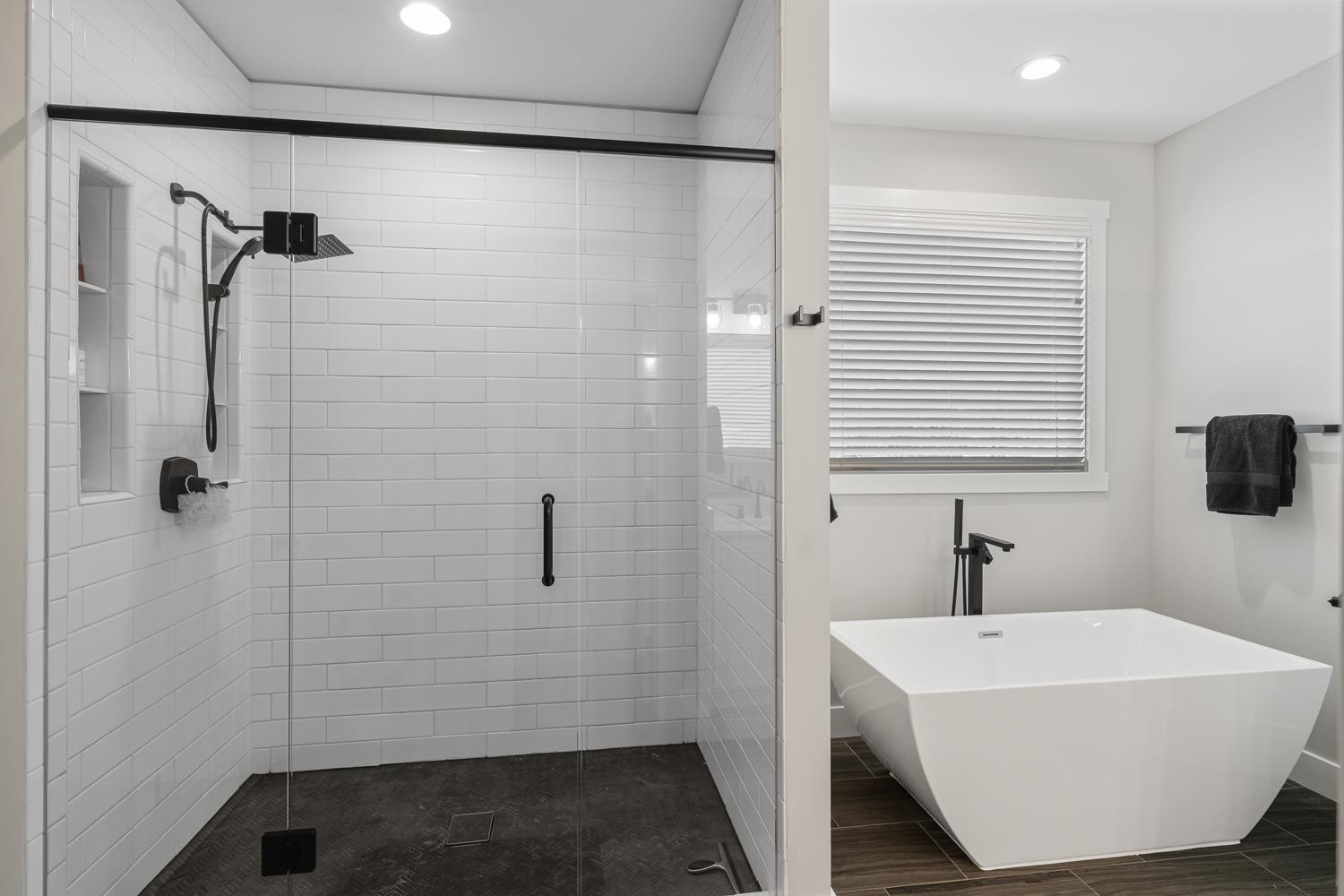 795 Madison Ridge Road Lawrenceburg, IN 47025 - Photo 30 of 72 A free-standing steeping tub and double sized tile shower line the right wall.