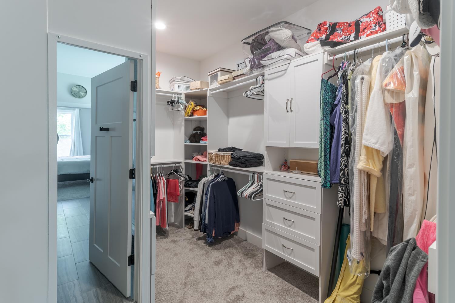 795 Madison Ridge Road Lawrenceburg, IN 47025 - Photo 33 of 72 A spacious walk-in closet is complete with custom built-ins.