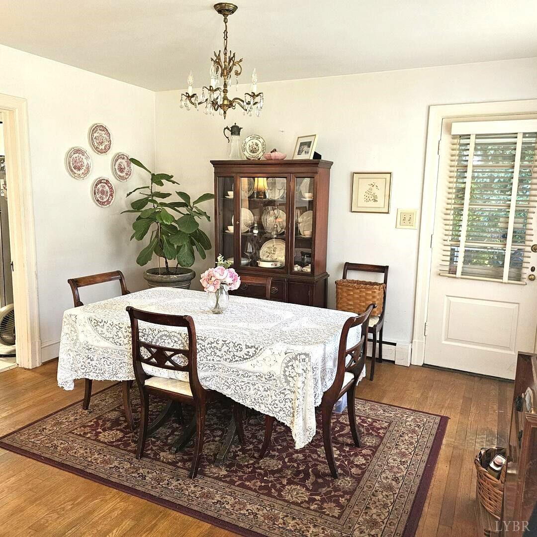 20 Peaks Road Prospect, VA 23960 - Photo 4 of 19 a view of a dining room with furniture window and wooden floor