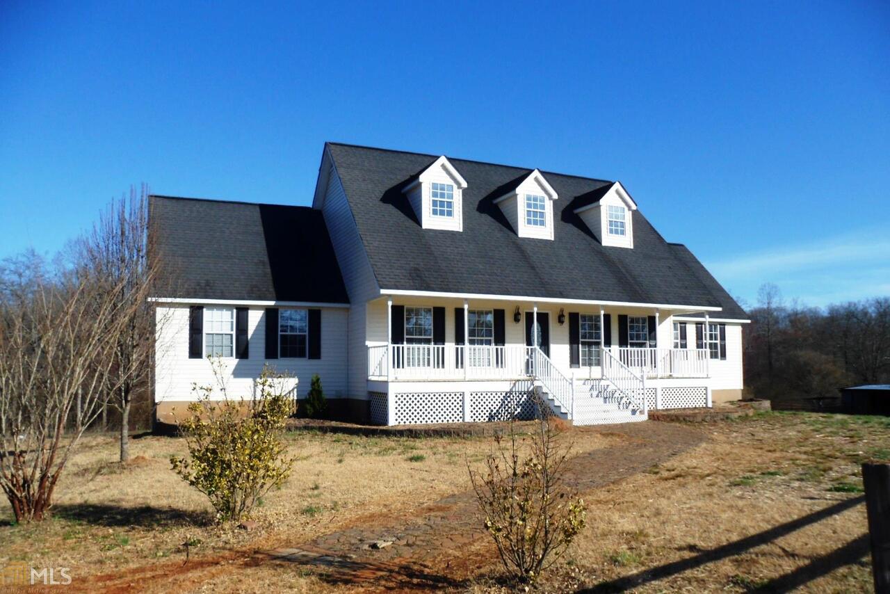 1186 Sutton Road Demorest, GA 30535 - Photo 1 of 1 a front view of a house with a yard