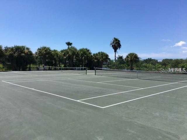 10036 63rd Avenue North, Unit 16 St. Petersburg, FL 33708 - Photo 29 of 30 a view of a tennis court