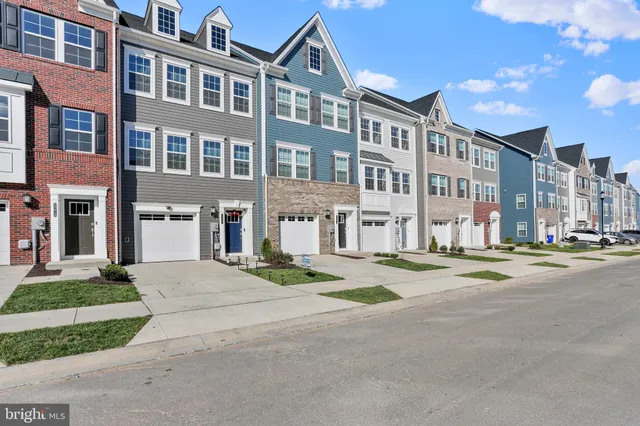 a front view of a building with street view