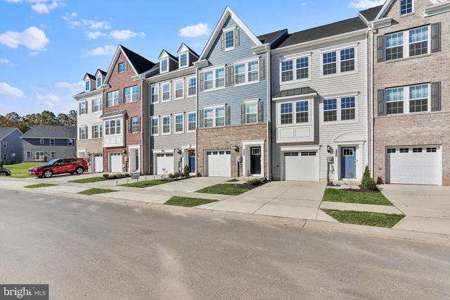 a front view of a building with a street