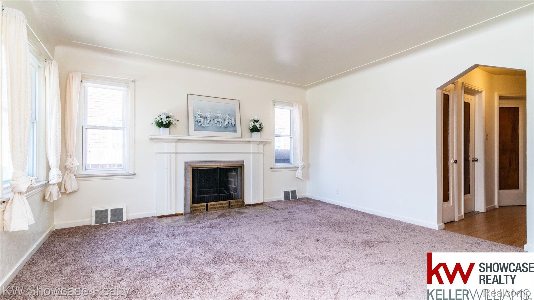 18468 Rutherford Street Detroit, MI 48235 - Photo 3 of 15 Living Room with fireplace