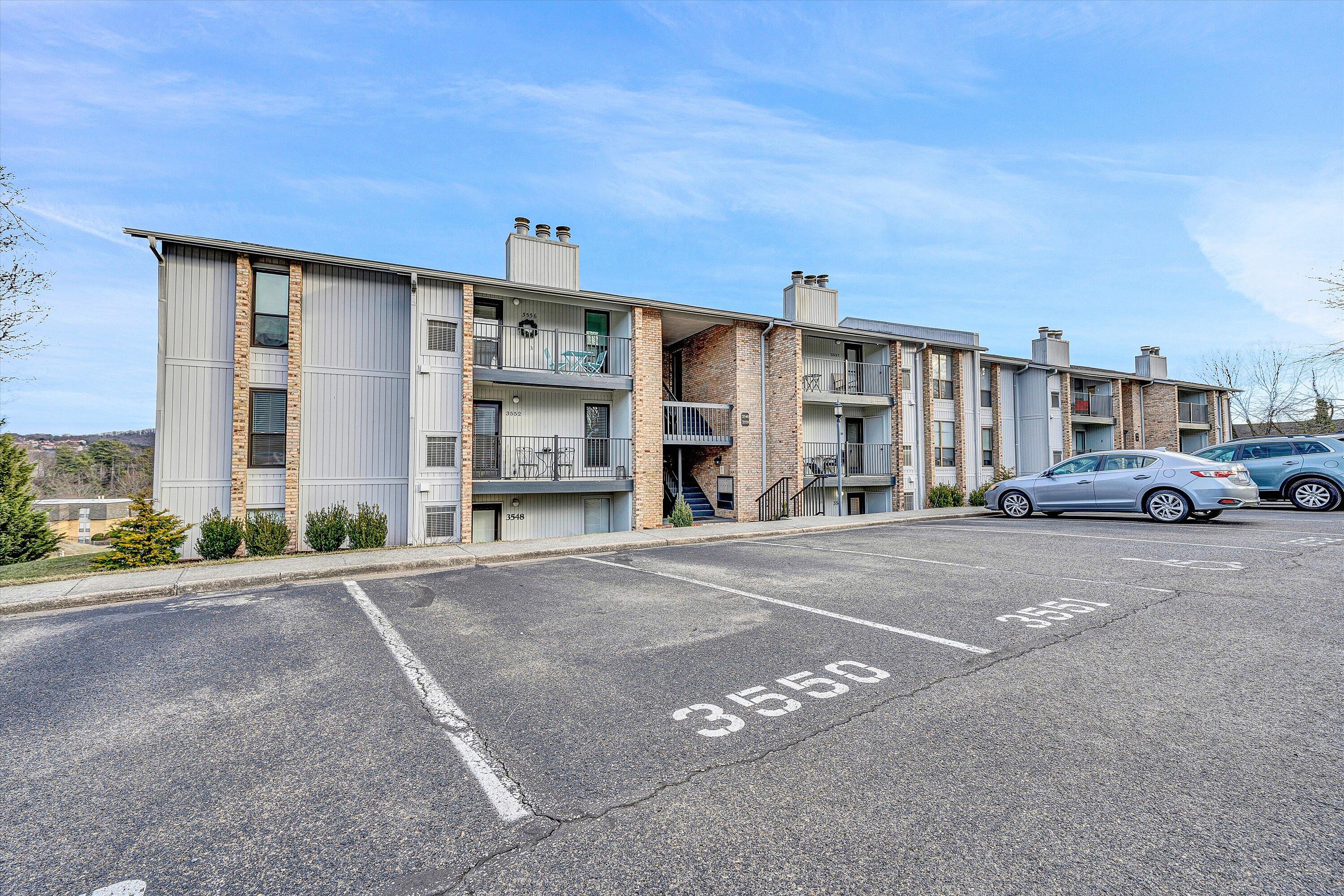 3549 Timberline Trail, Unit 149 Roanoke, VA 24018 - Photo 1 of 18 a car parked in front of a building