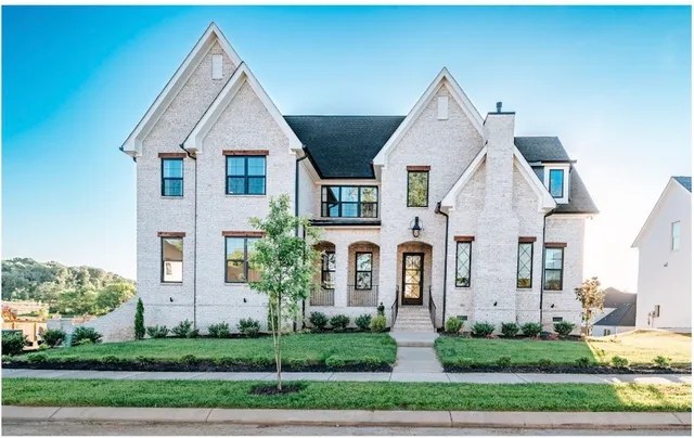 front view of house with a yard