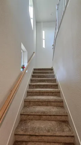 a view of a room with stairs