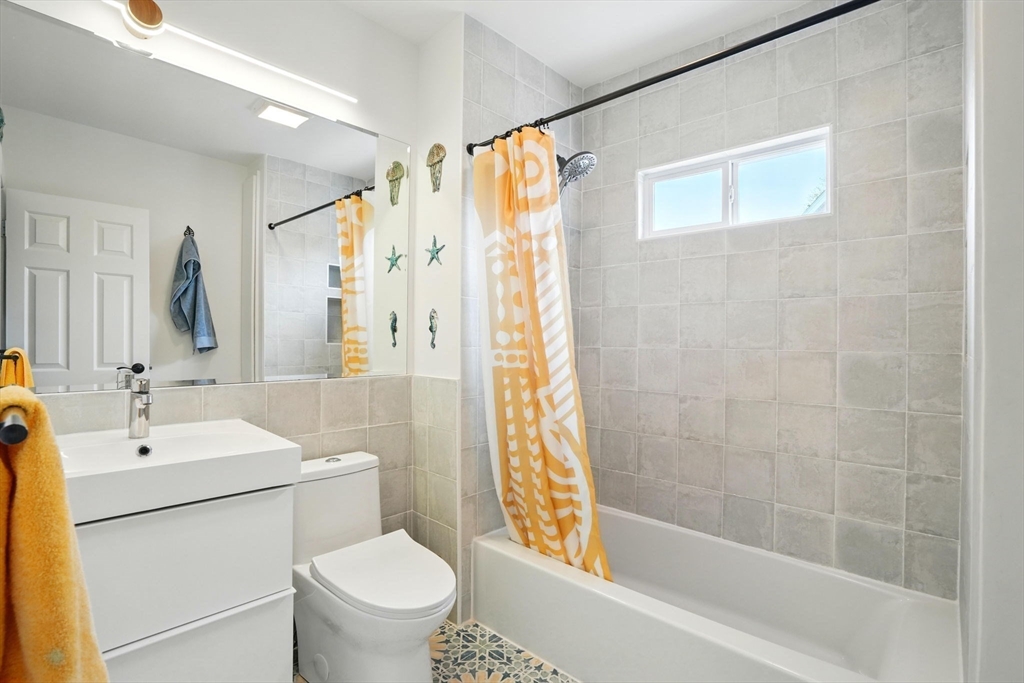 25 Bowdoin Street Somerville, MA 02143 - Photo 14 of 28 a bathroom with a sink toilet and shower