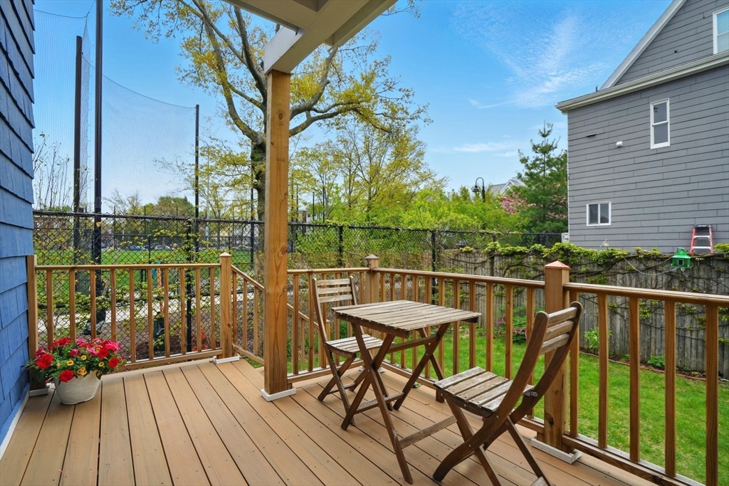 25 Bowdoin Street Somerville, MA 02143 - Photo 24 of 28 a view of a chairs on the roof deck