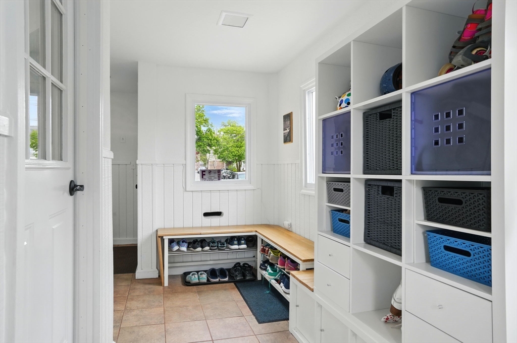 25 Bowdoin Street Somerville, MA 02143 - Photo 3 of 28 a room with furniture and a window