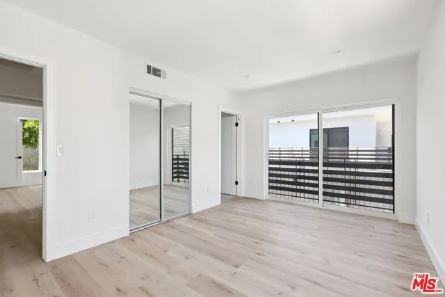 wooden floor and closet in a room
