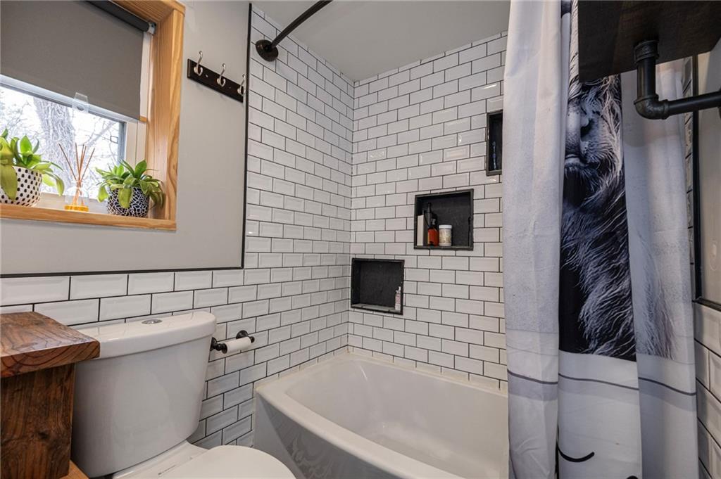 7608 Cheyenne Street Pittsburgh, PA 15218 - Photo 27 of 33 a bathroom with a toilet and a shower