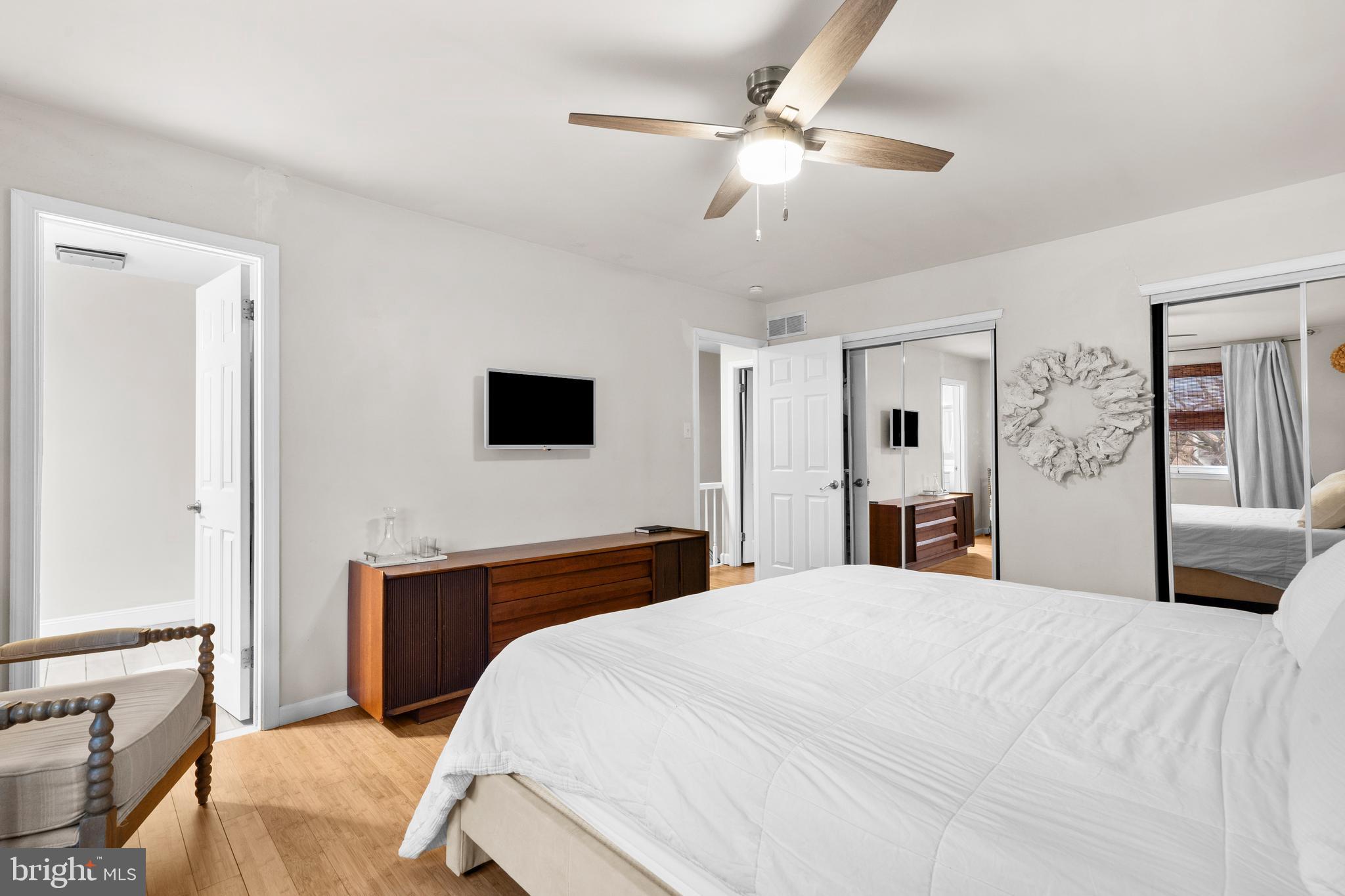 105 South Timber Road Southampton, PA 18966 - Photo 21 of 40 a bedroom with a bed and a chandelier
