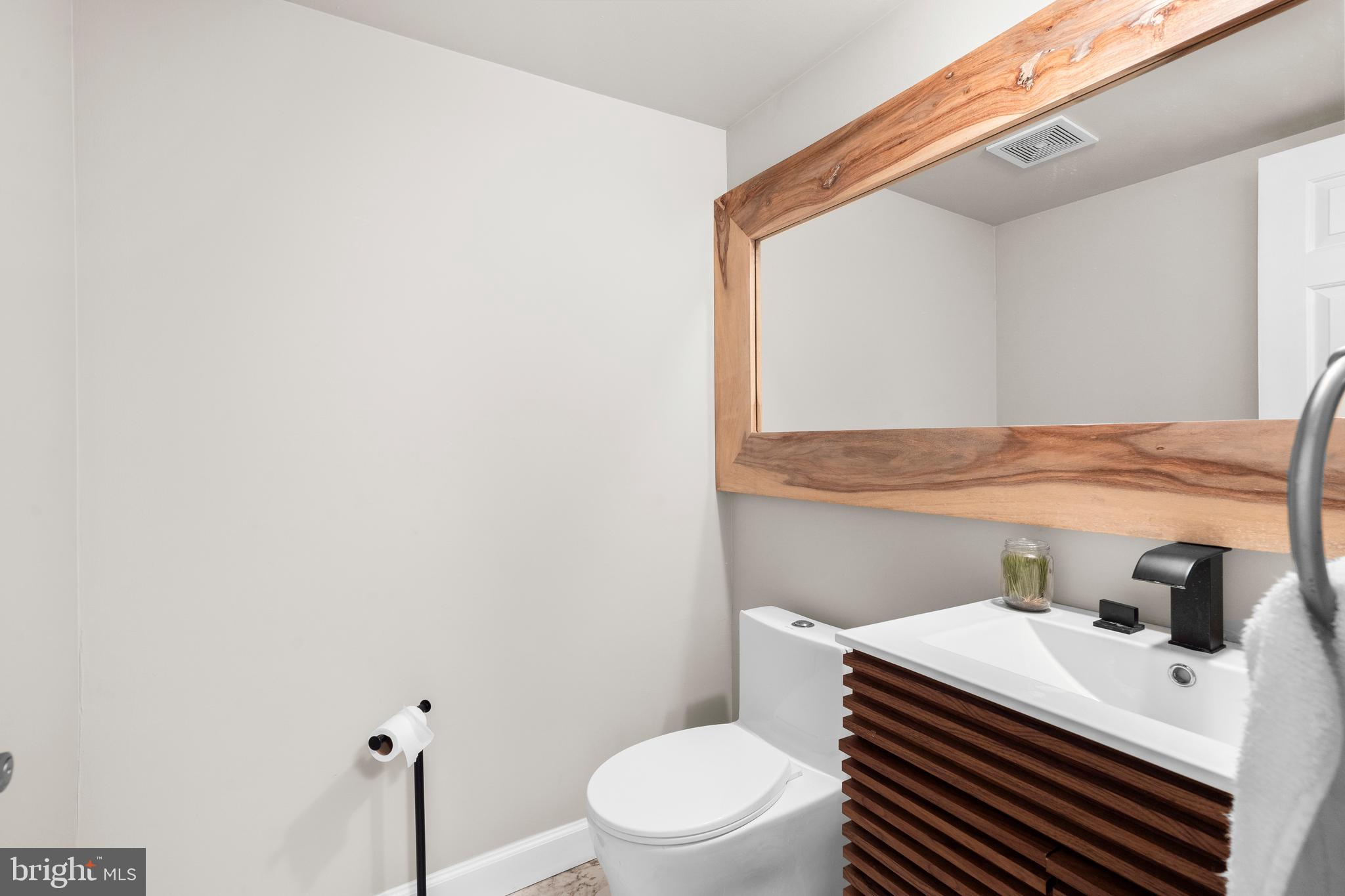 105 South Timber Road Southampton, PA 18966 - Photo 9 of 40 a bathroom with a sink a toilet and mirror