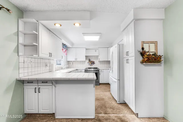 a bathroom with a sink a toilet and bathtub