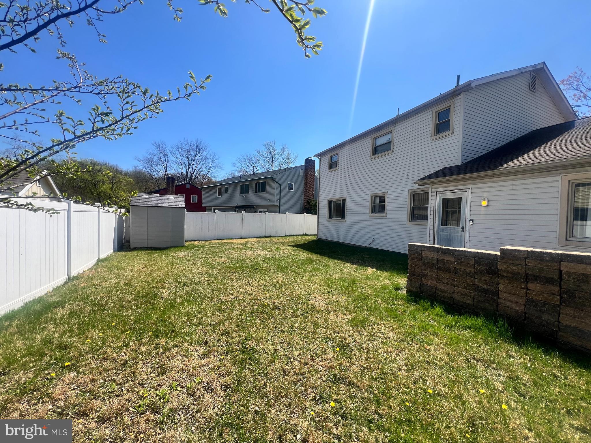 361 Independence Boulevard Lawnside, NJ 08045 - Photo 14 of 14 a view of a backyard with a large tree