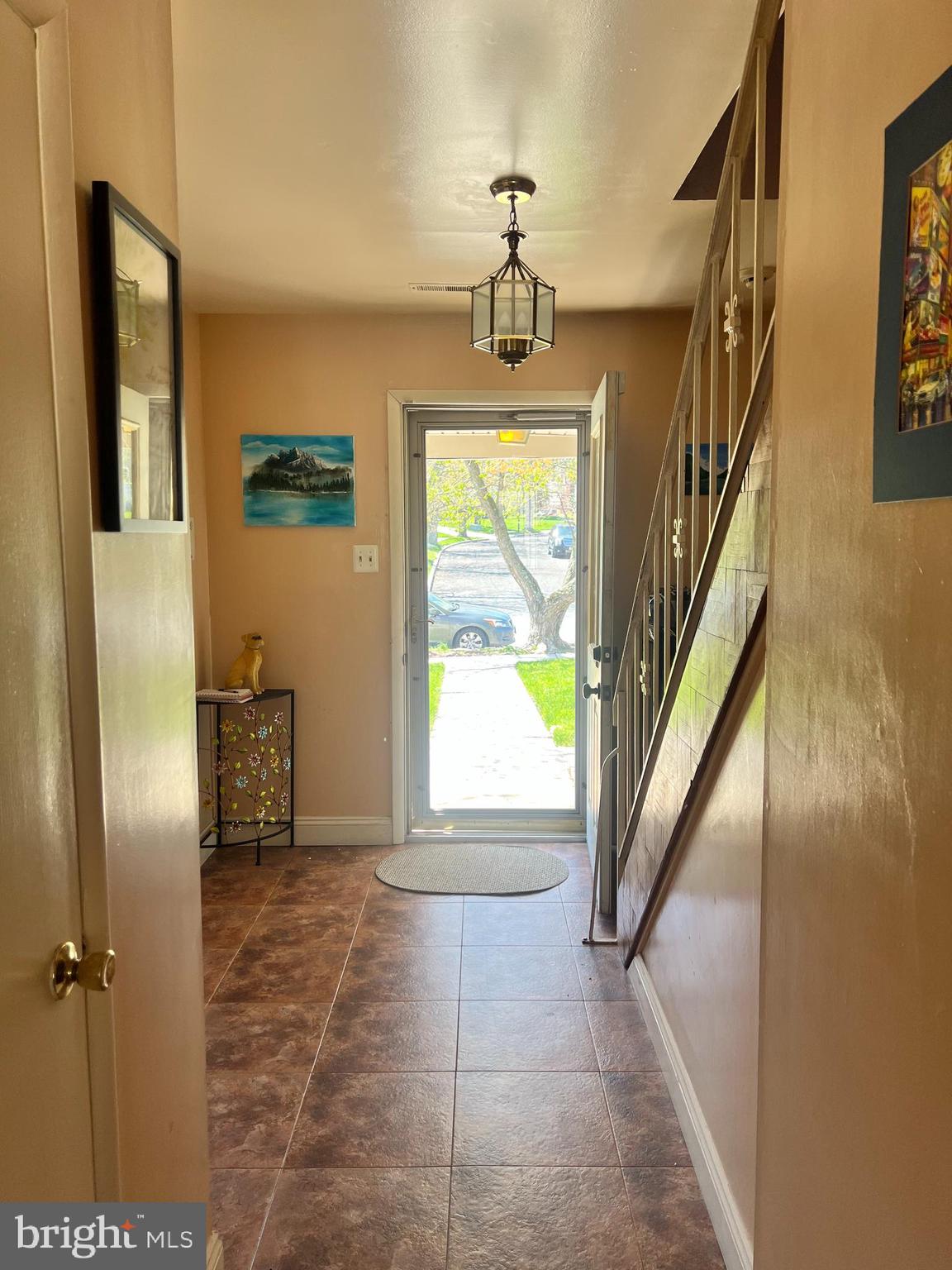 361 Independence Boulevard Lawnside, NJ 08045 - Photo 2 of 14 a view of empty room with wooden floor and fan