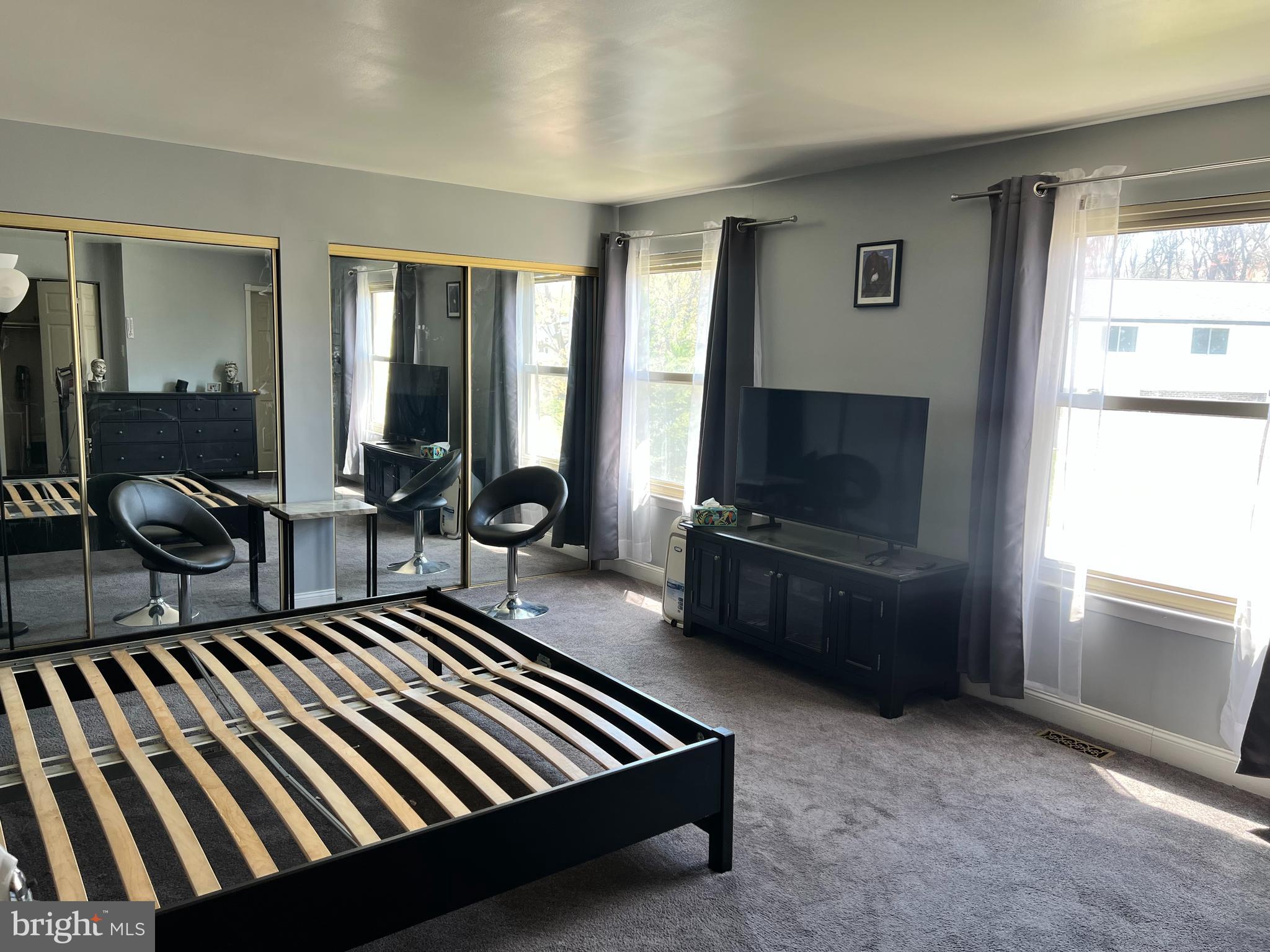 361 Independence Boulevard Lawnside, NJ 08045 - Photo 10 of 14 a living room with furniture rug and window