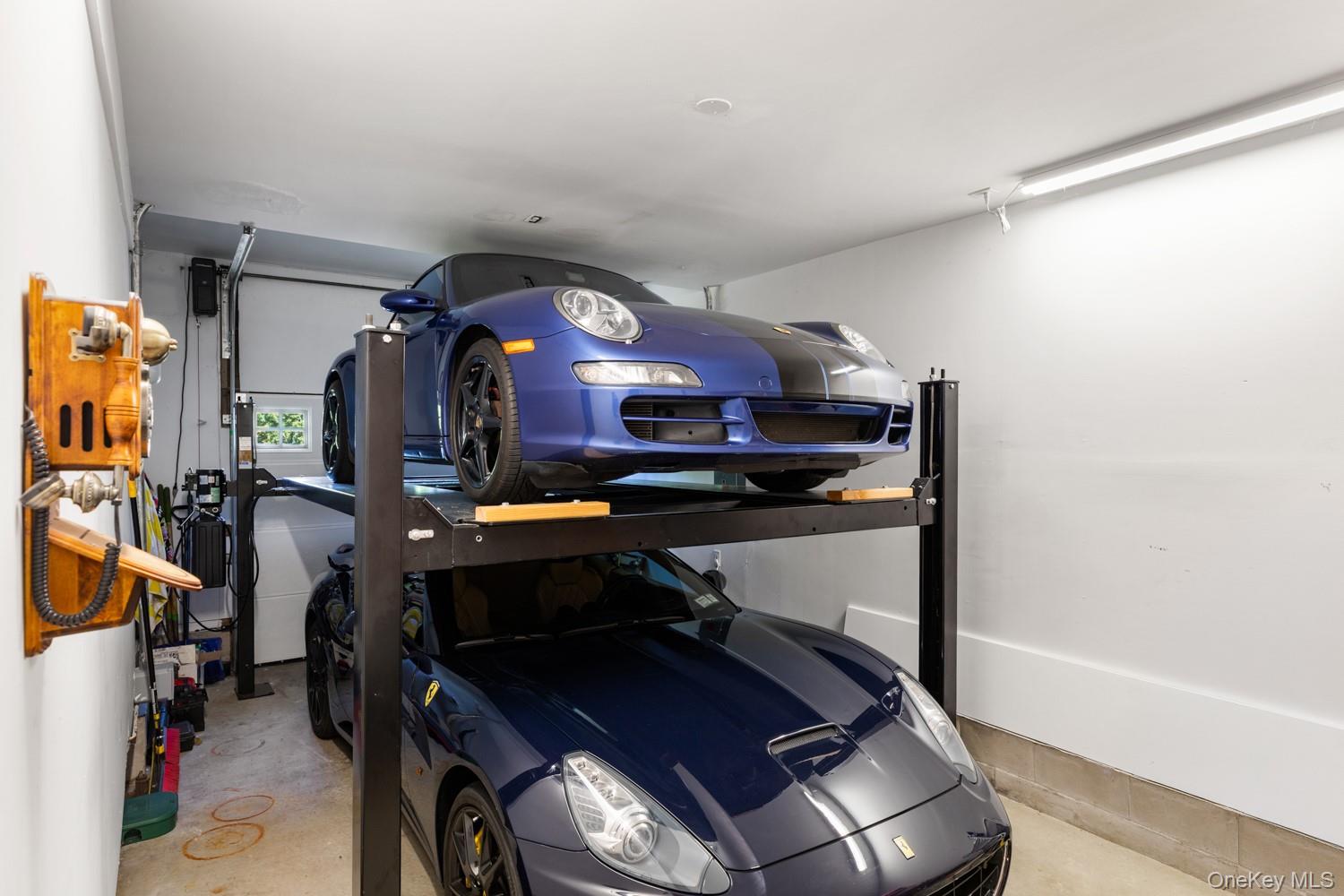 137 South Road Westhampton, NY 11977 - Photo 44 of 50 One car garage with rack