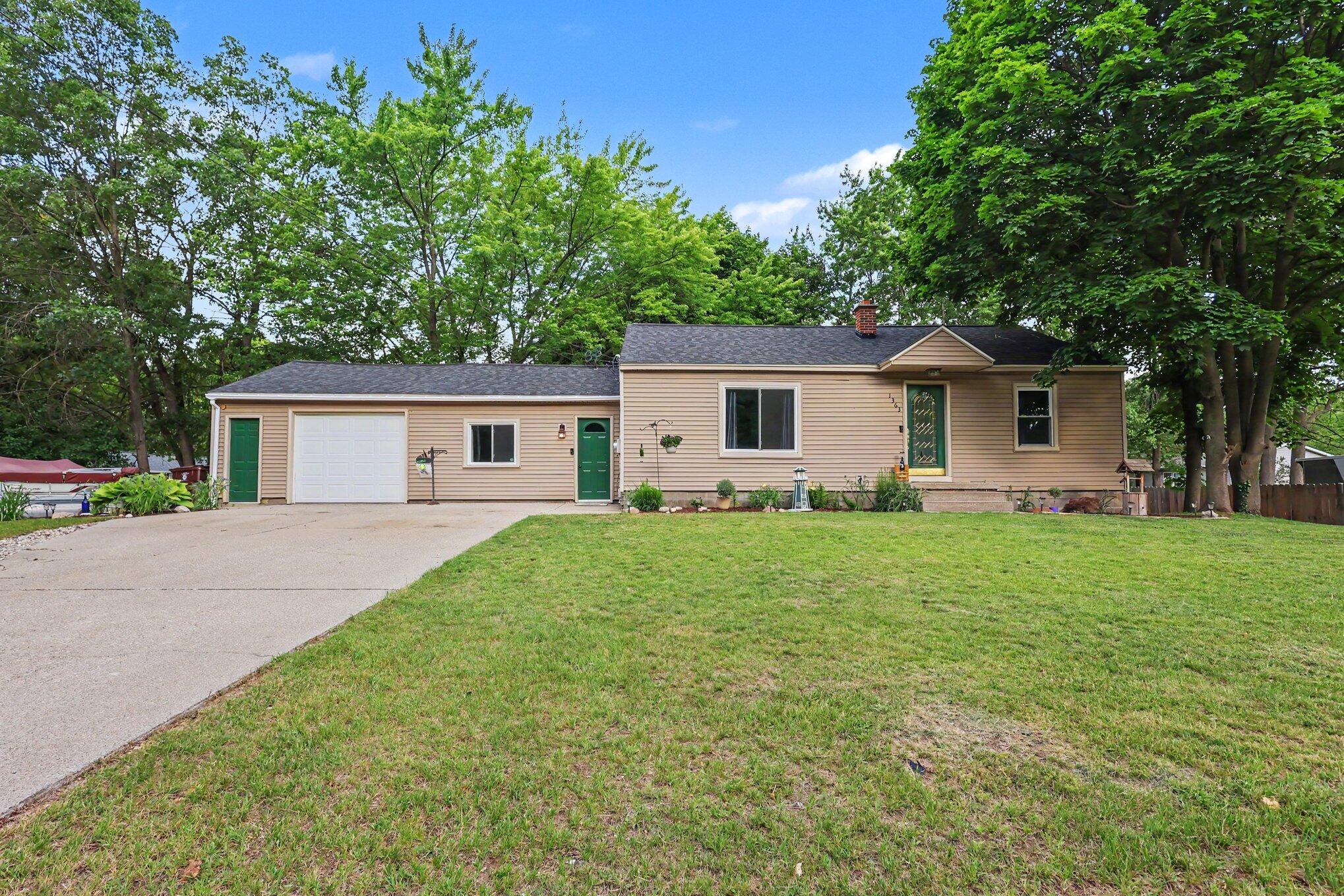 1363 Quarterline Road Muskegon, MI 49442 - Photo 1 of 22 002_file_4432
