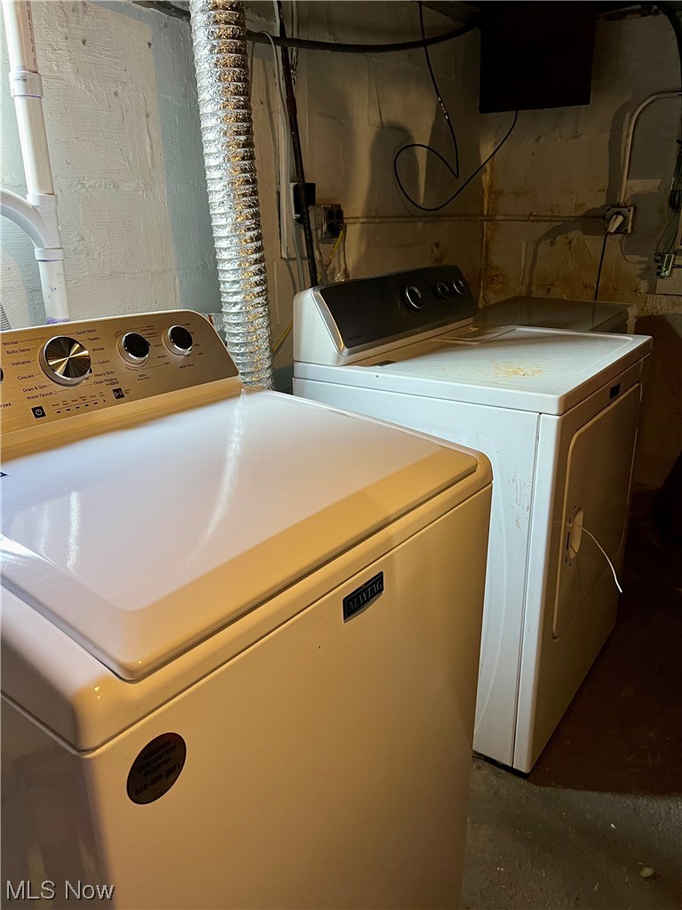 157 North 2nd Street Rittman, OH 44270 - Photo 42 of 43 Laundry area featuring electric dryer hookup and washing machine and dryer