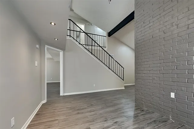 a view of entryway with wooden floor