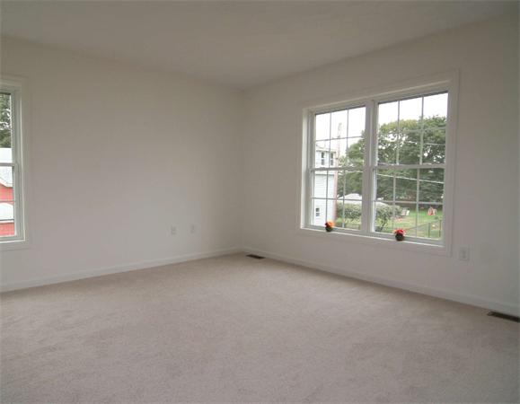 6 Blue Jay Circle, Unit 2 Wakefield, MA 01880 - Photo 16 of 17 an empty room with windows