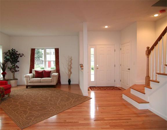 6 Blue Jay Circle, Unit 2 Wakefield, MA 01880 - Photo 3 of 17 a living room with furniture and a window