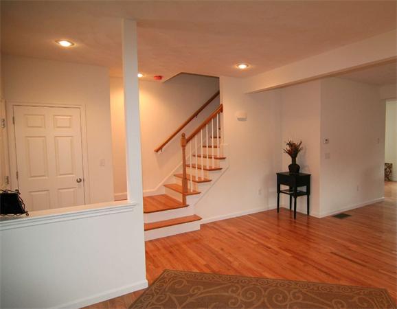 6 Blue Jay Circle, Unit 2 Wakefield, MA 01880 - Photo 4 of 17 a view of entryway and hall with wooden floor
