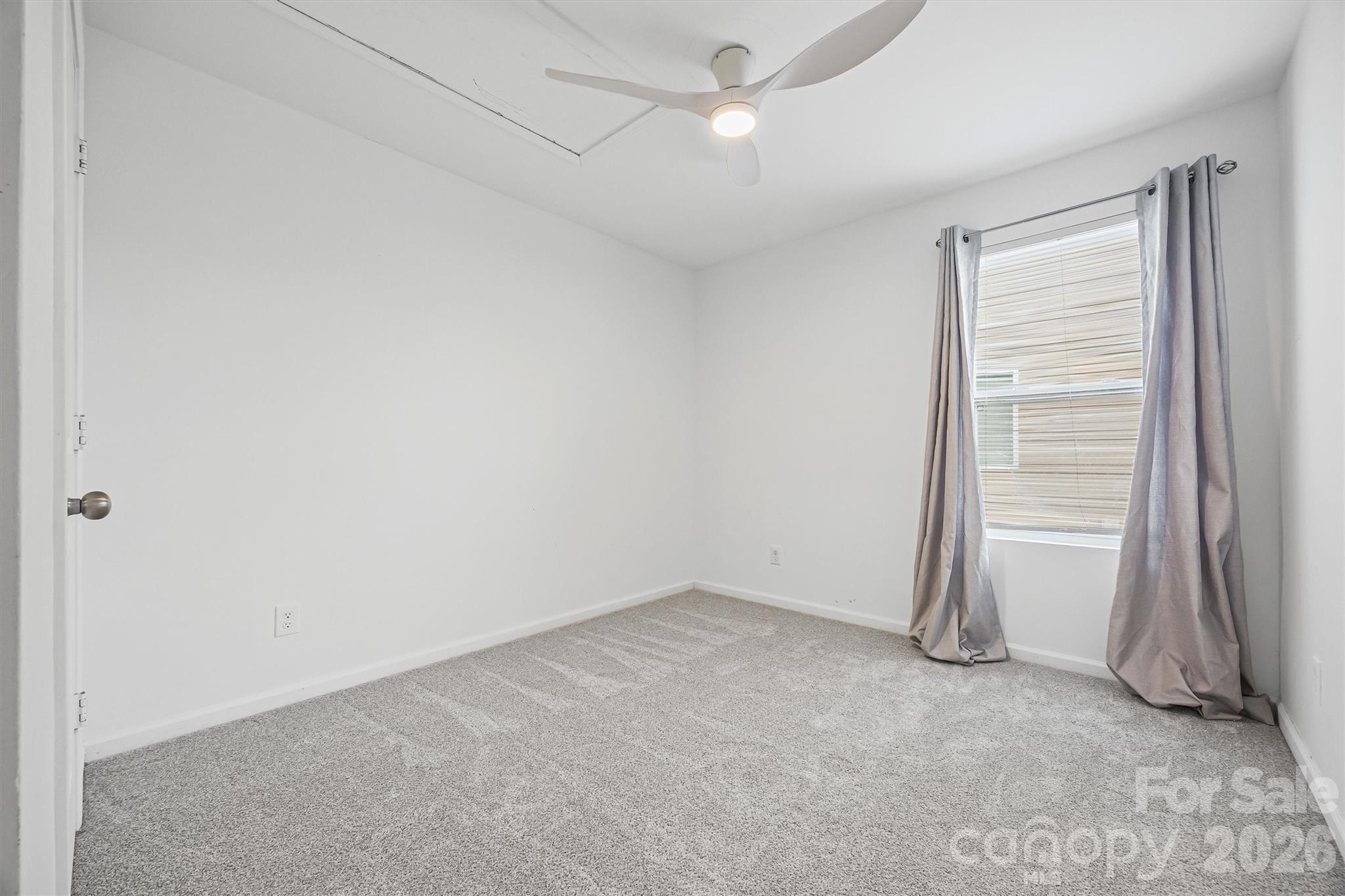 831 Yale Street, Unit 30 Rock Hill, SC 29730 - Photo 21 of 30 an empty room with a empty space and a window