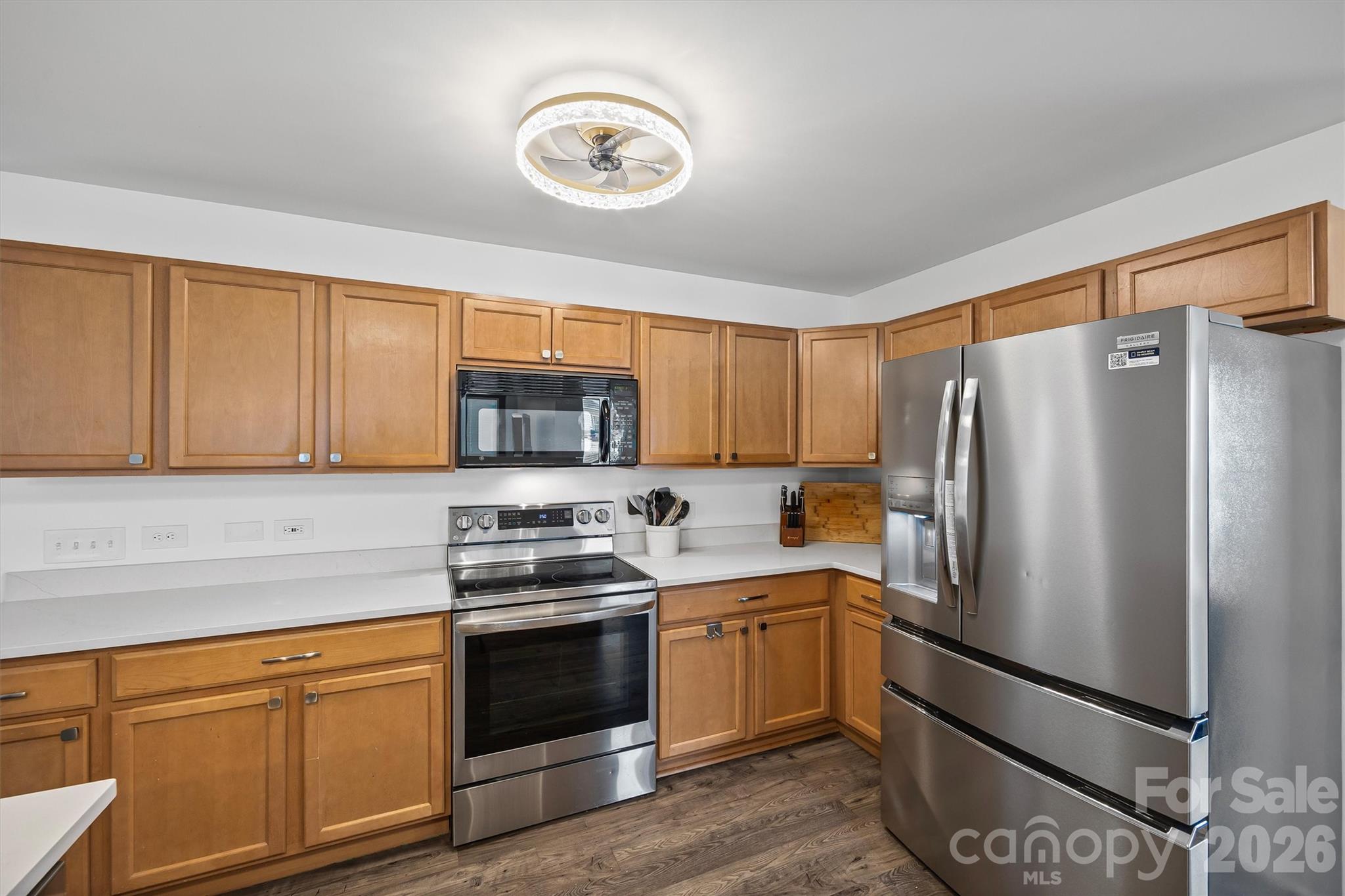831 Yale Street, Unit 30 Rock Hill, SC 29730 - Photo 7 of 30 a kitchen with stainless steel appliances granite countertop a refrigerator stove and sink