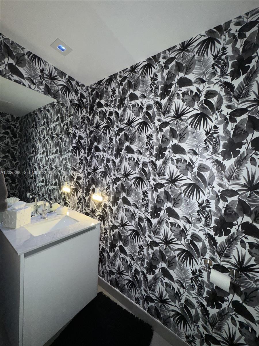 788 Northeast 23rd Street, Unit 1202 Miami, FL 33137 - Photo 25 of 64 a utility room with dryer and washer