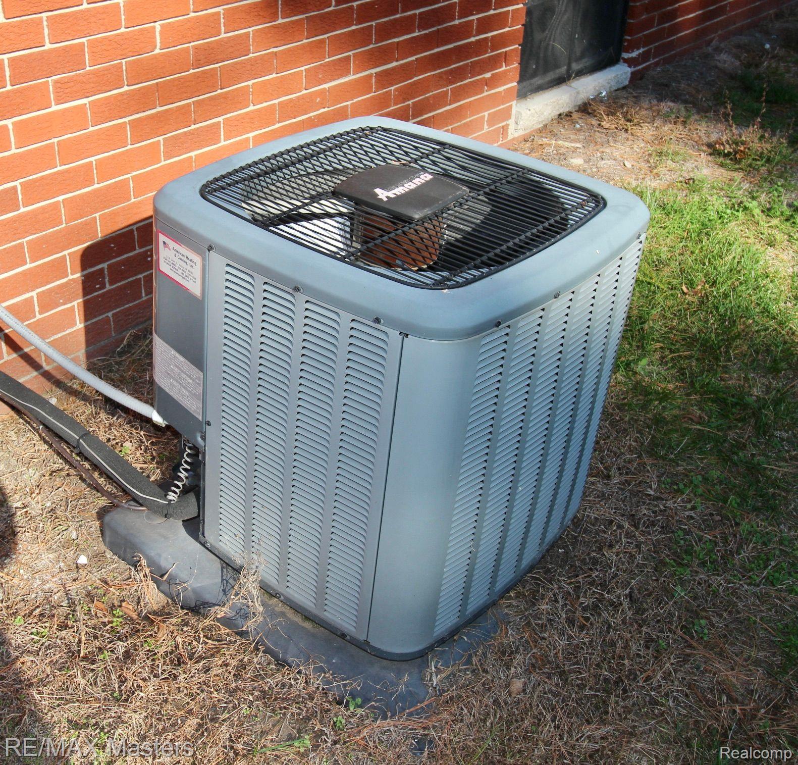 12527 Sumpter Road Carleton, MI 48117 - Photo 32 of 33 Newer A/C unit.