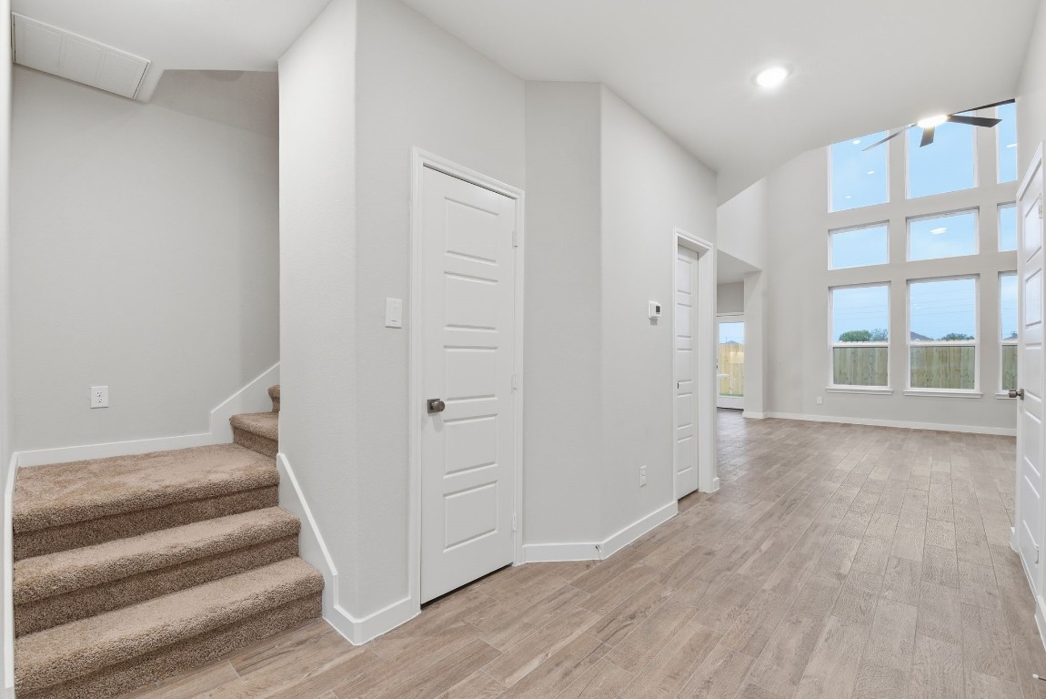 2415 Inlet Court Fresno, TX 77545 - Photo 22 of 50 a view of an entryway with wooden floor and door