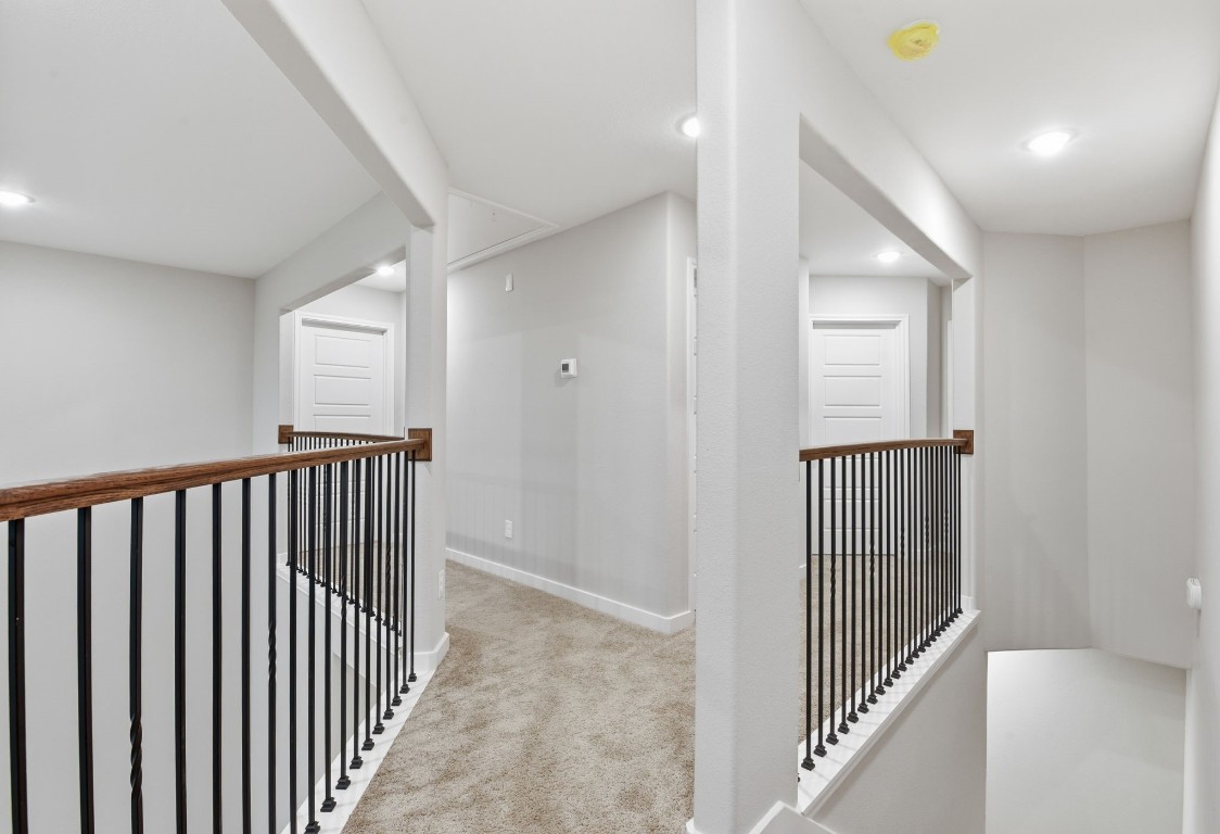 2415 Inlet Court Fresno, TX 77545 - Photo 23 of 50 a view of a hallway with windows