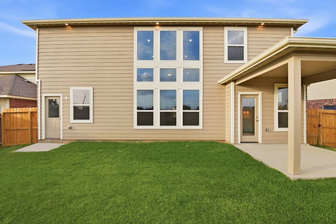 2415 Inlet Court Fresno, TX 77545 - Photo 44 of 50 a view of a house with a yard