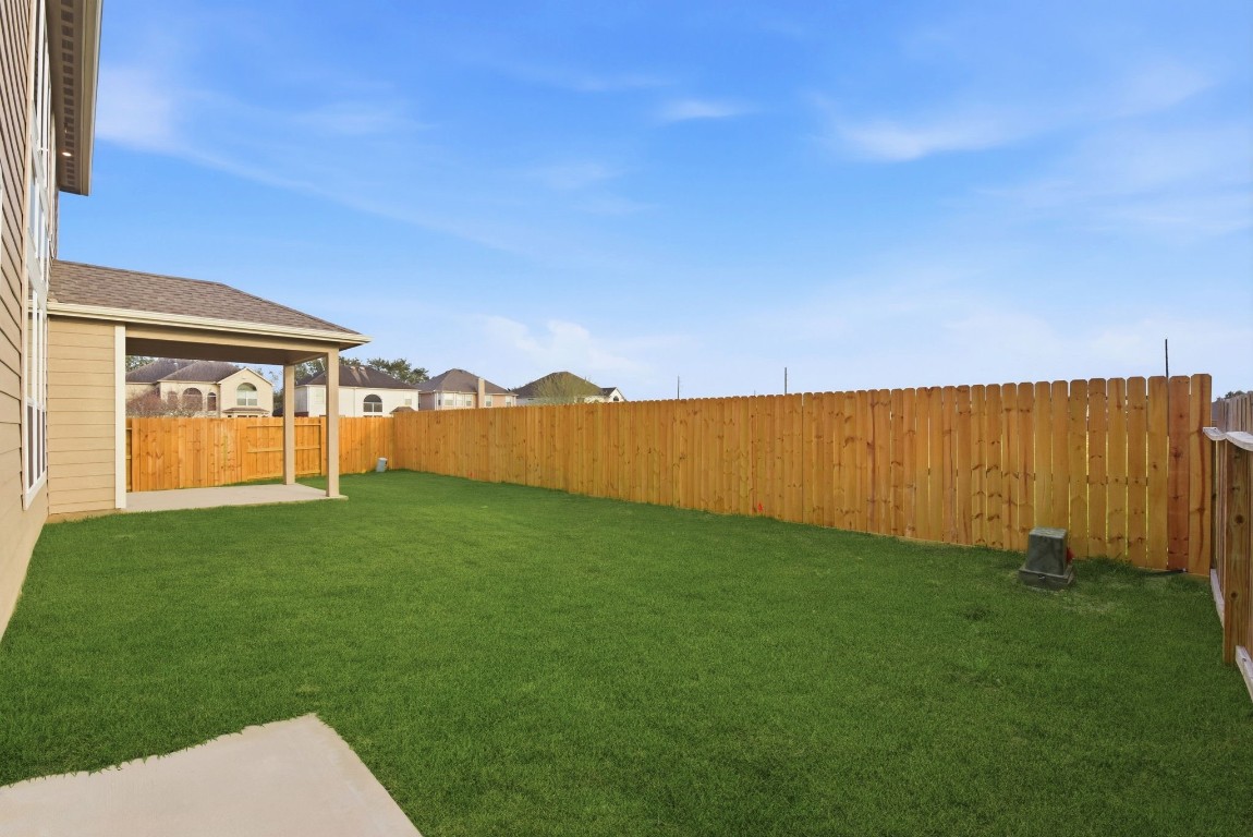 2415 Inlet Court Fresno, TX 77545 - Photo 46 of 50 a view of a backyard