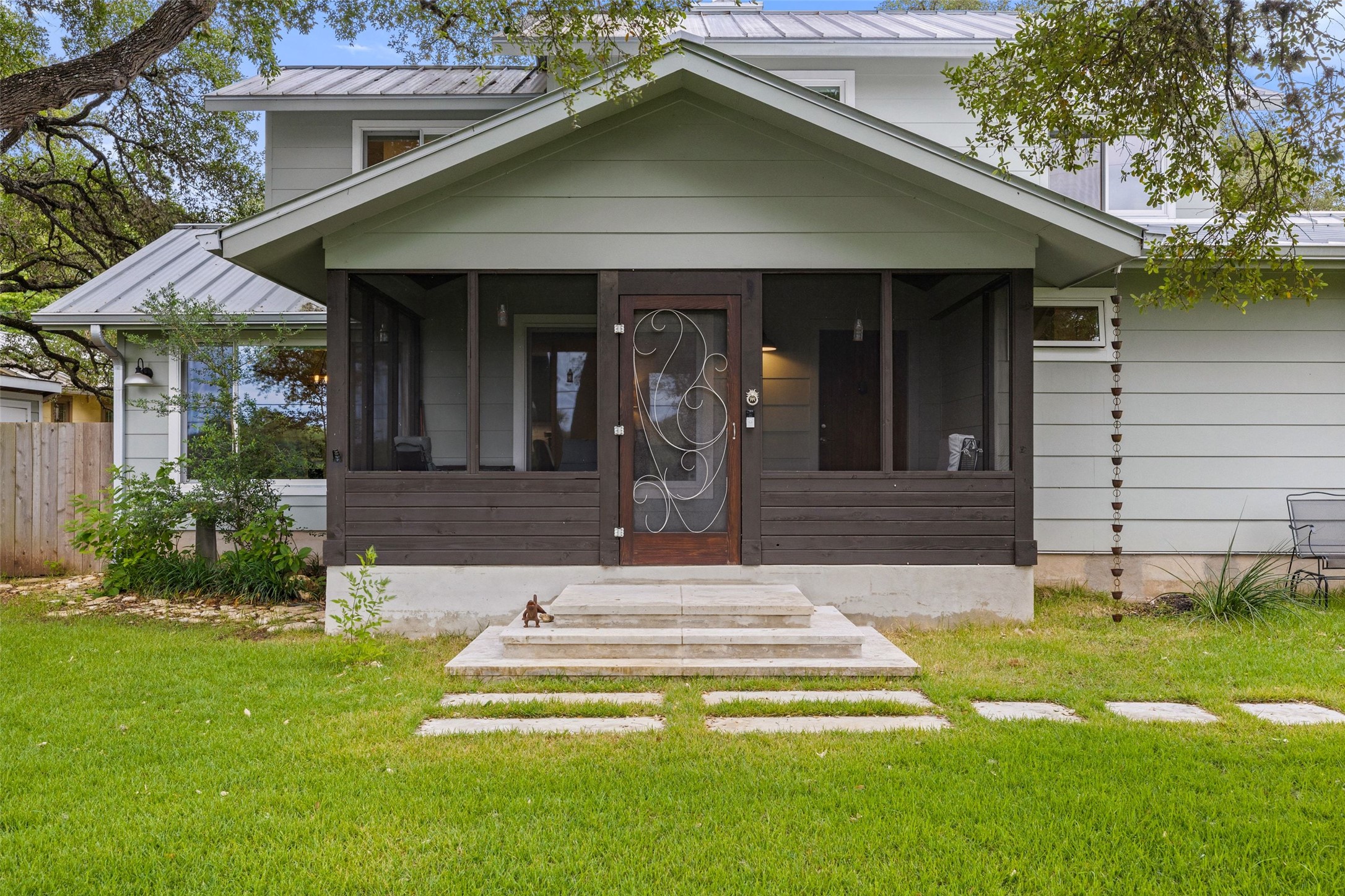 701 River Road Blanco, TX 78606 - Photo 5 of 38 a front view of a house with garden