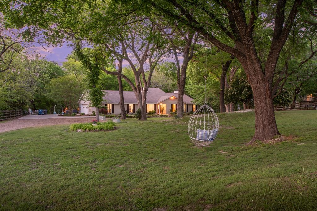 1451 Meandro Ria Lane Fairview, TX 75069 - Photo 3 of 38 a garden view with a fountain