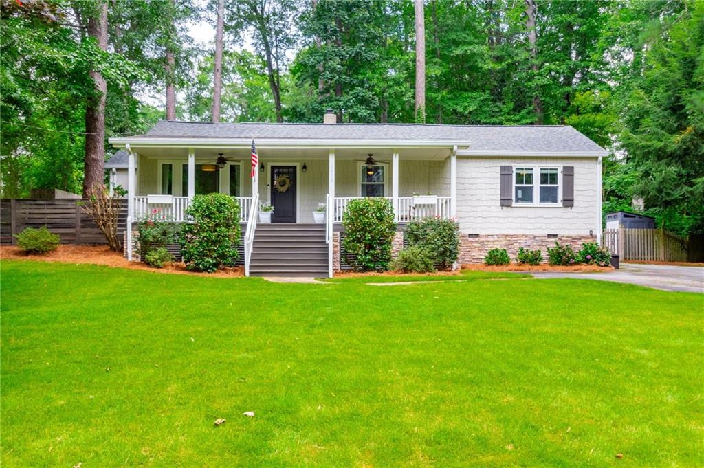1878 Hickory Road Chamblee, GA 30341 - Photo 1 of 1 a front view of house with yard and green space