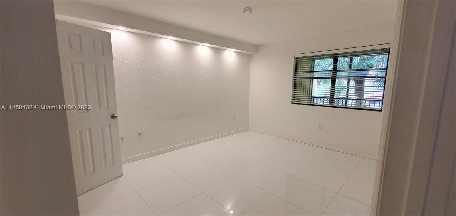 15661 Southwest 104th Terrace, Unit 321 Miami, FL 33196 - Photo 14 of 21 a view of an empty room