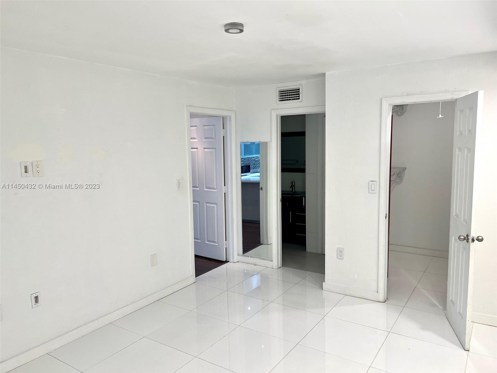 15661 Southwest 104th Terrace, Unit 321 Miami, FL 33196 - Photo 16 of 21 a view of an empty room