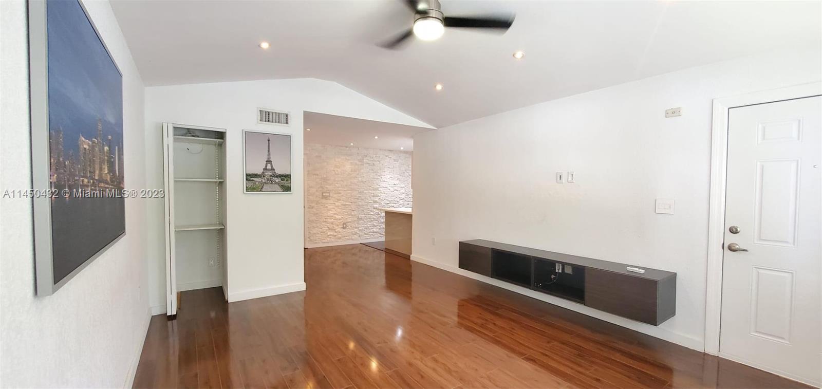 15661 Southwest 104th Terrace, Unit 321 Miami, FL 33196 - Photo 5 of 21 a view of a hallway with wooden floor