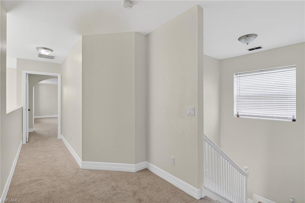 5012 Fairhaven Lane Naples, FL 34109 - Photo 25 of 28 a view of hallway with closet