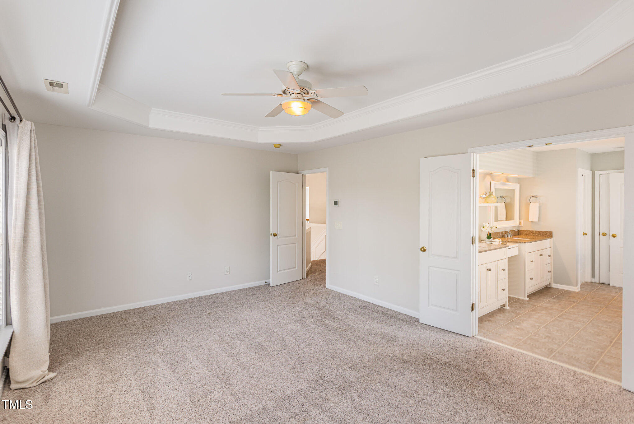 7533 Silver View Lane Raleigh, NC 27613 - Photo 13 of 25 a view of an empty room with a window