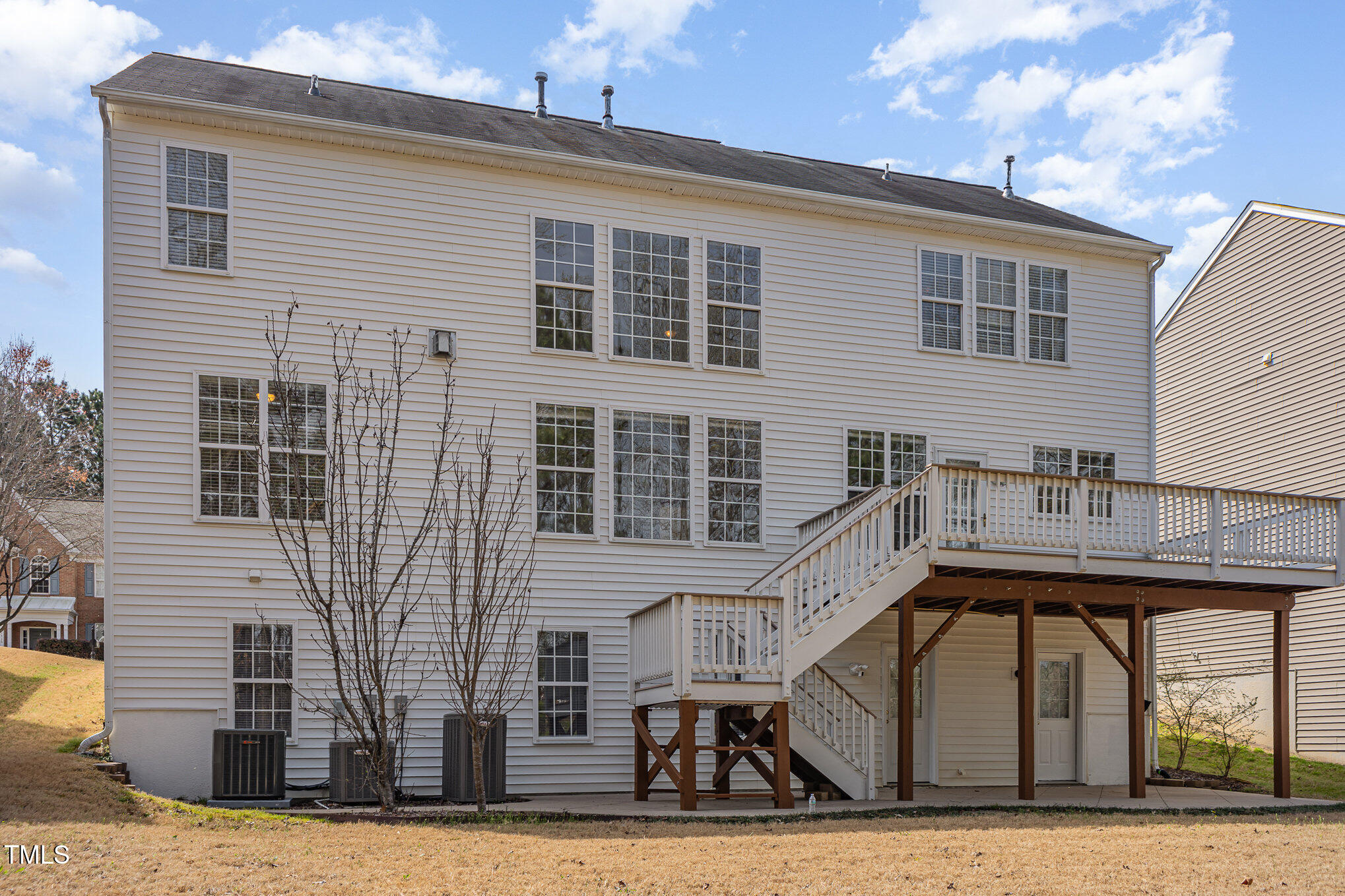 7533 Silver View Lane Raleigh, NC 27613 - Photo 24 of 25 a front view of a house with large windows