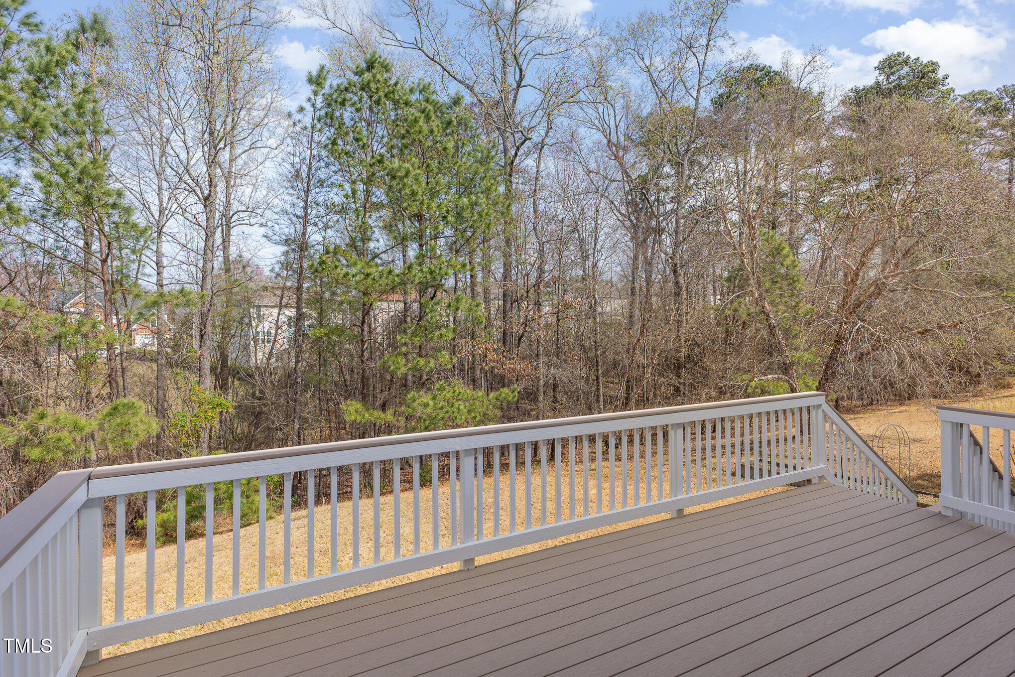 7533 Silver View Lane Raleigh, NC 27613 - Photo 25 of 25 a view of balcony with wooden floor and fence