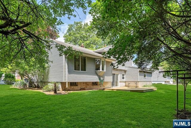 516 Knickerbocker Road Cresskill, NJ 07626 - Photo 29 of 31 a front view of house with yard and green space
