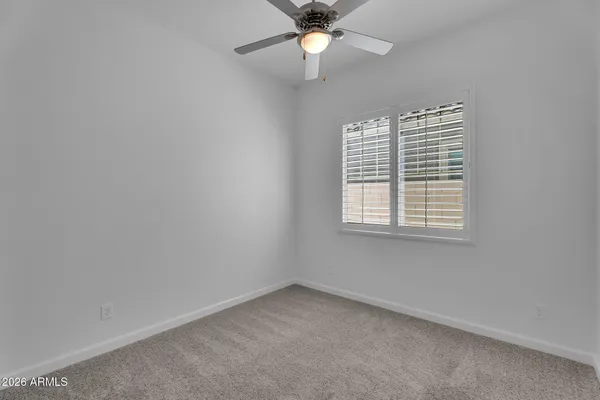 wooden floor and window in an empty room