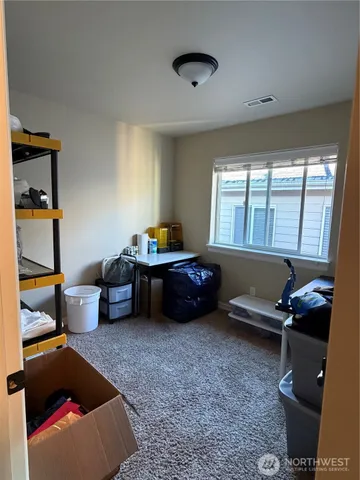 a room with furniture and a window